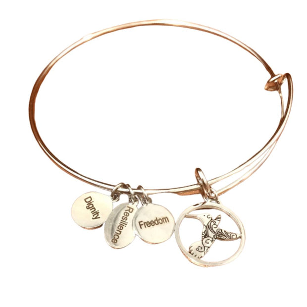 Hummingbird bracelet with charms