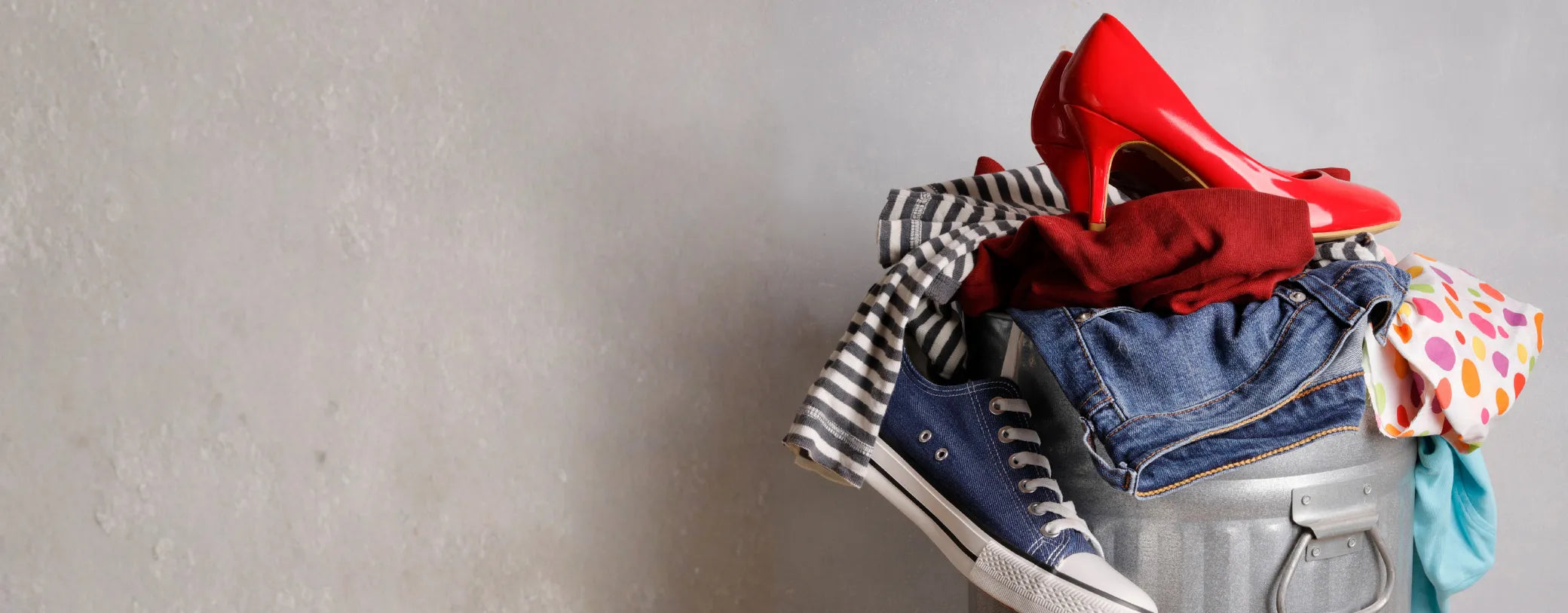 different articles of clothing thrown in a garbage bin reposted by Made for Freedom