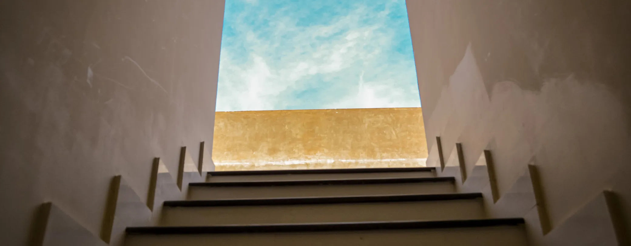 stairs leading up to a bright and sunny view signifying hope reposted by made for freedom