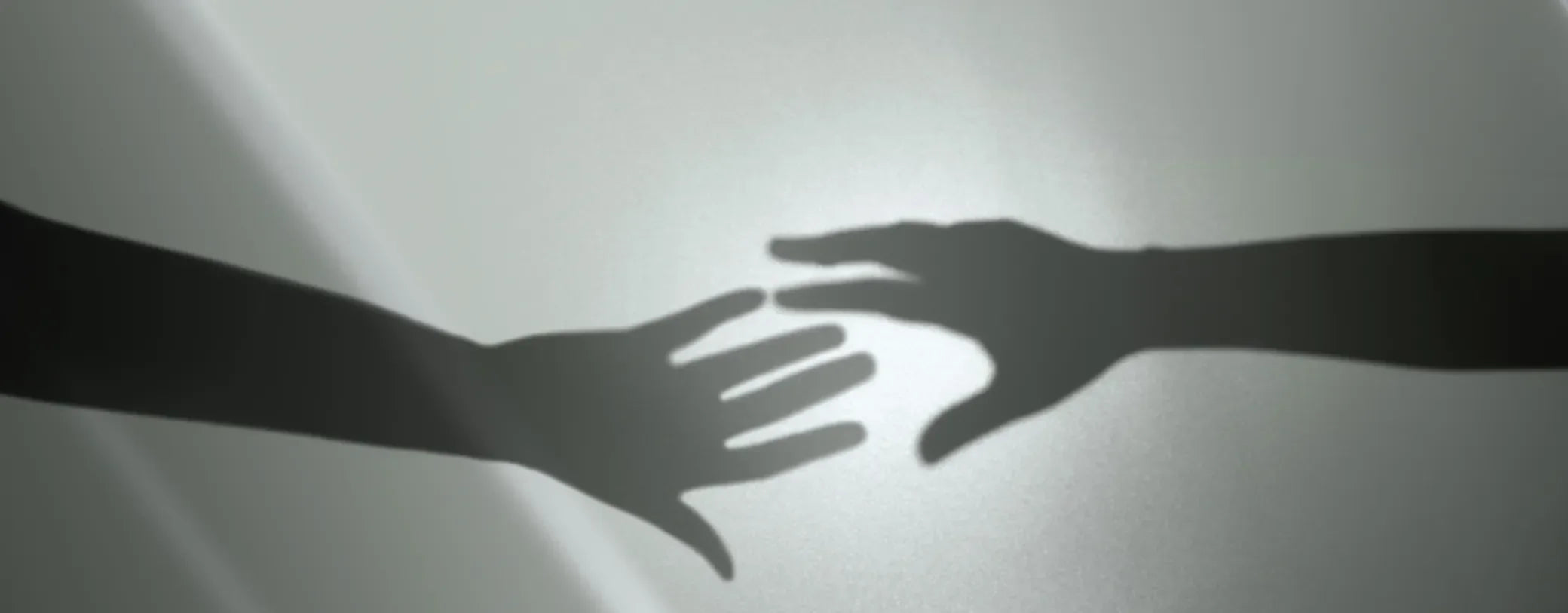 shadows of hands reaching out to each other reposted by Made for Freedom