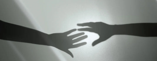 shadows of hands reaching out to each other reposted by Made for Freedom