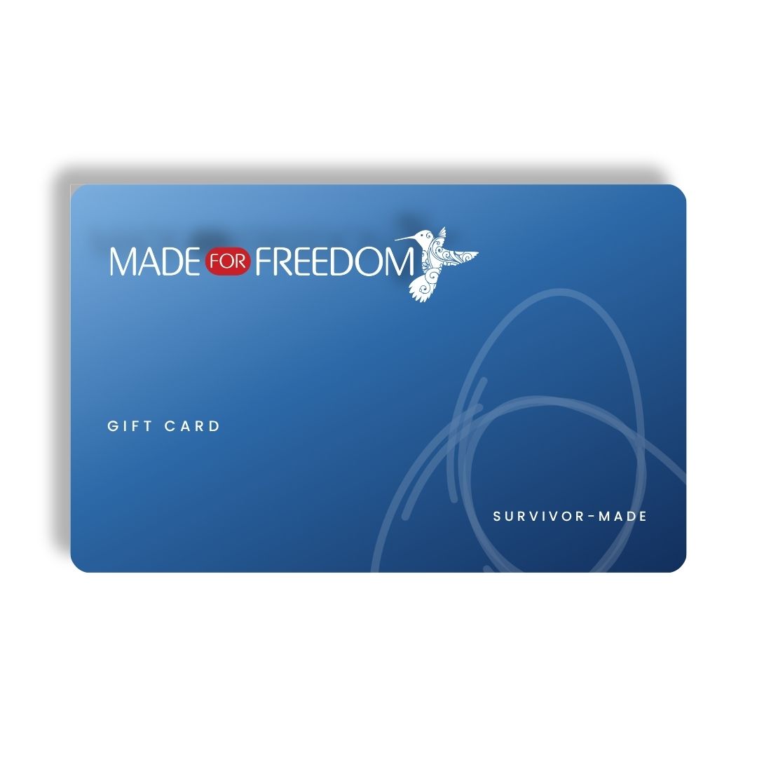 A blue Made for Freedom gift card with white text and a small white bird logo, shown on a clean white background.
