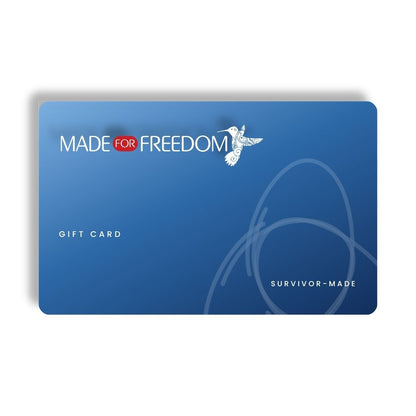 A blue Made for Freedom gift card with white text and a small white bird logo, shown on a clean white background.