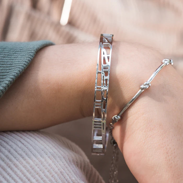 Restoring justice bangle stainless steel