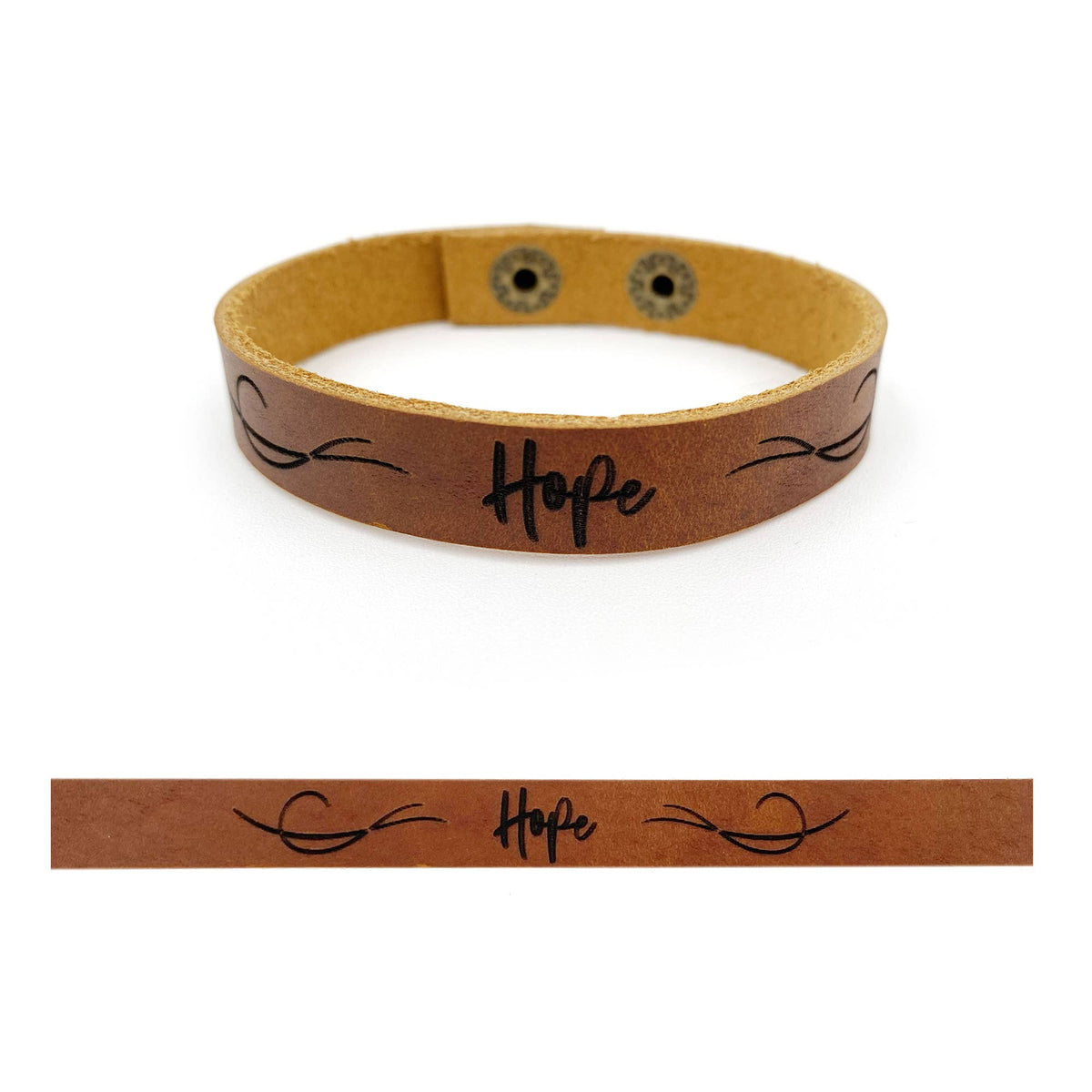 A brown leather bracelet with a tan interior, featuring the word 'Hope' and decorative black scroll designs, shown on a white background with a close-up detail strip below.